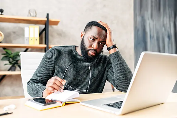 man browsing for sales tax relief